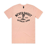 Never Shoot With Your Drinkin' Hand Premium Tee - Pale Pink